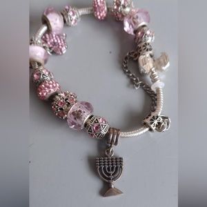 Silver pandora bracelet with pink and Hanukkah charm